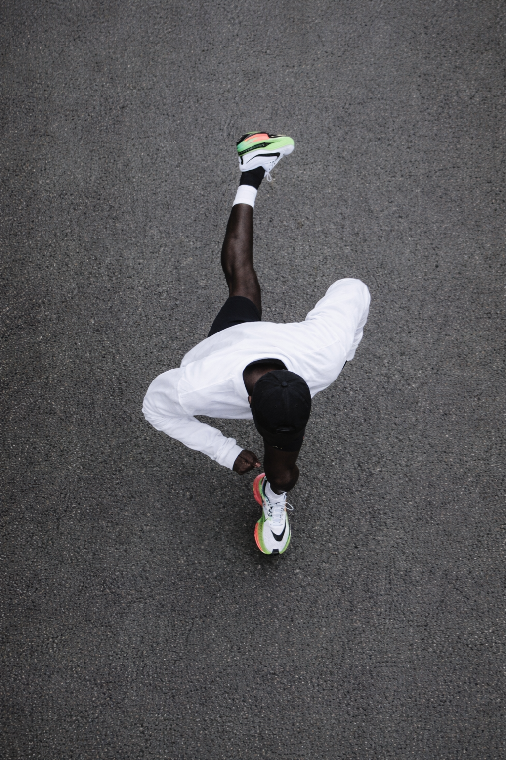 Athlete airborne in Paradise Zero training apparel.